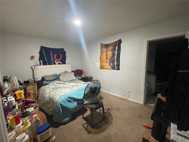 bedroom with light carpet