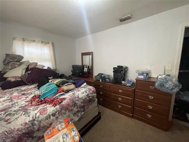 bedroom featuring light colored carpet