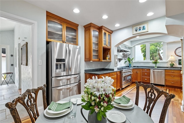 6010 17th Ave S, Gulfport, FL 33707 - kitchen featuring stainless steel appliances and dark stone counters