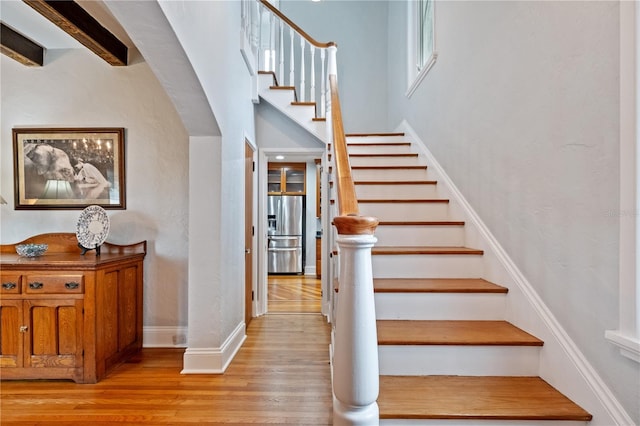 6010 17th Ave S, Gulfport, FL 33707 - stairs with wood-type flooring and a high ceiling