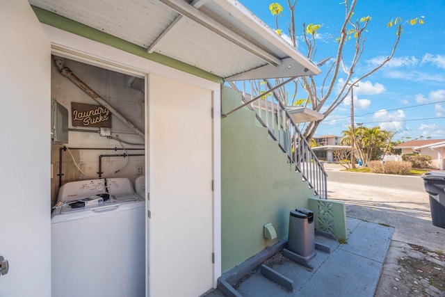 exterior space with separate washer and dryer