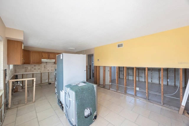 interior space with light tile patterned floors