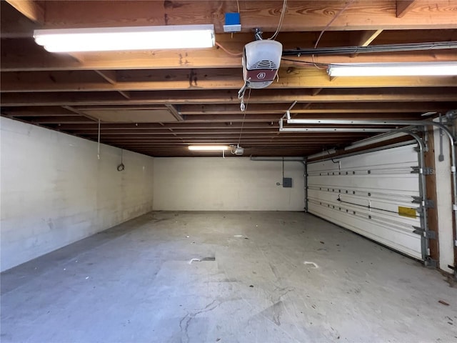 garage featuring a garage door opener