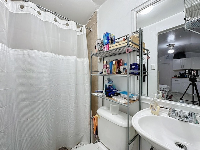 3911 Auburndale Ave, Orlando, FL 32839 - bathroom with walk in shower, toilet, and sink