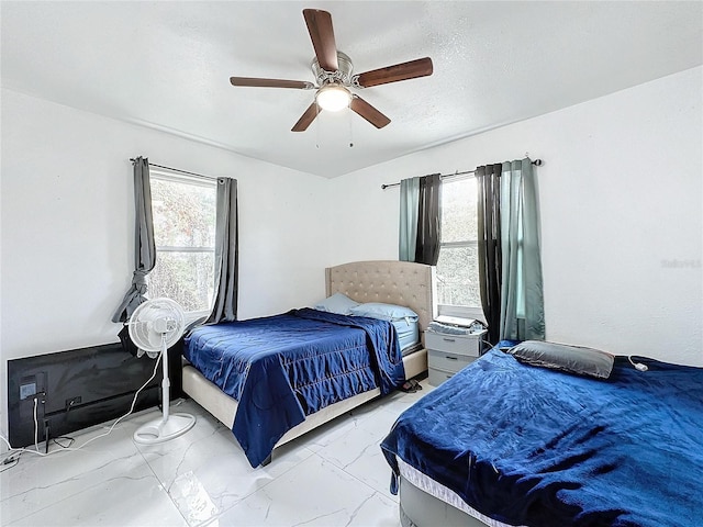 3911 Auburndale Ave, Orlando, FL 32839 - bedroom with ceiling fan and a textured ceiling