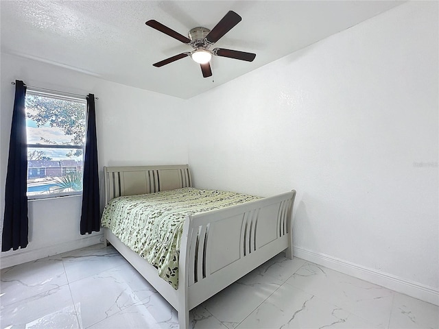 3911 Auburndale Ave, Orlando, FL 32839 - bedroom featuring ceiling fan and a textured ceiling