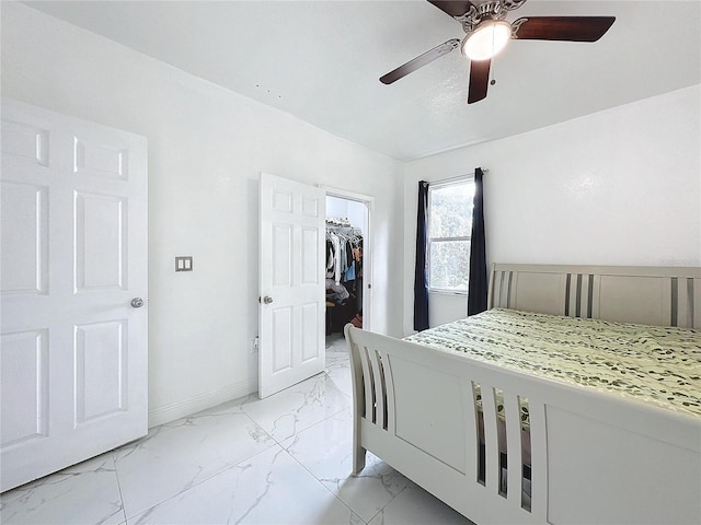 3911 Auburndale Ave, Orlando, FL 32839 - bedroom with a spacious closet, ceiling fan, and a closet