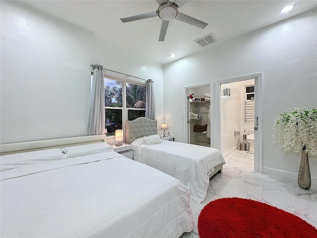 3911 Auburndale Ave, Orlando, FL 32839 - bedroom with a spacious closet, a closet, ceiling fan, and ensuite bathroom