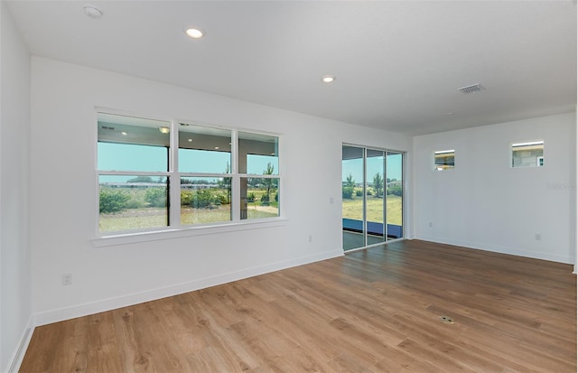 5295 SW 87th Ter, Ocala, FL 34481 - unfurnished room featuring wood finished floors, baseboards, and recessed lighting