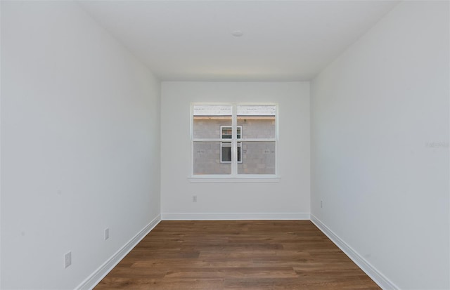 5295 SW 87th Ter, Ocala, FL 34481 - spare room featuring wood finished floors and baseboards