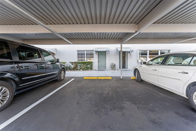 view of parking featuring a carport