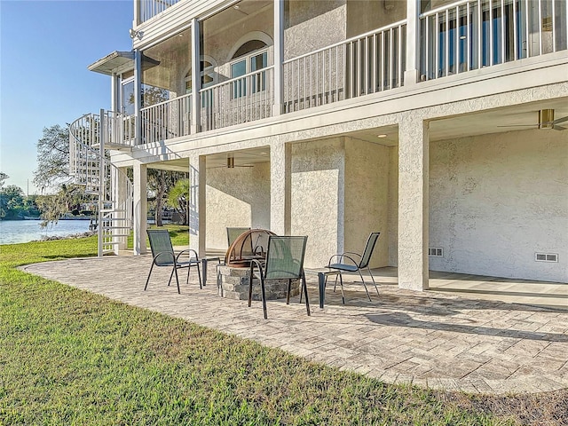 view of patio / terrace with a water view