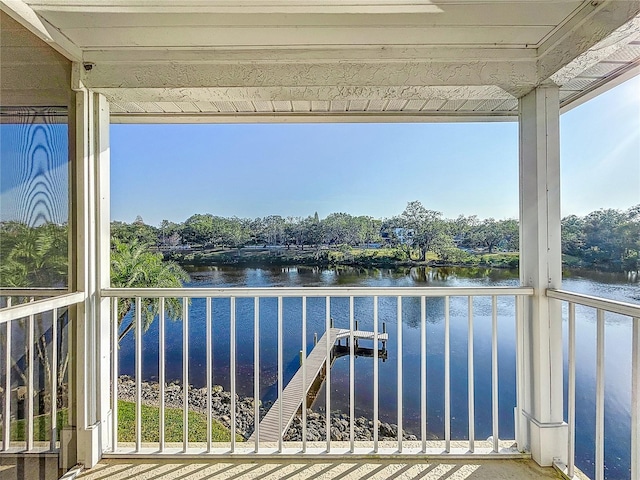 balcony featuring a water view