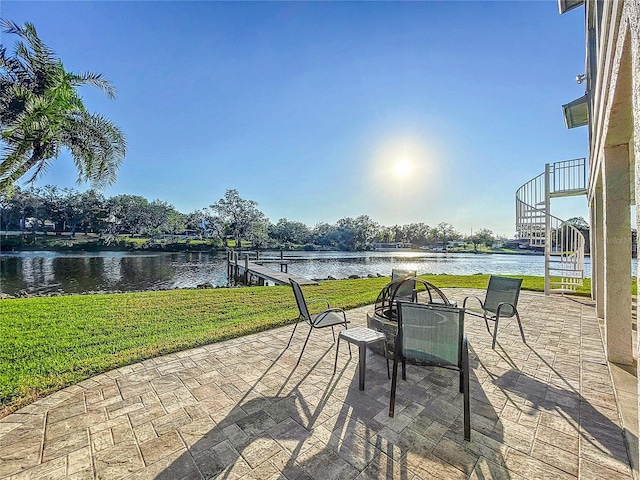 view of patio featuring a water view