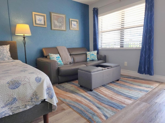 bedroom featuring hardwood / wood-style floors