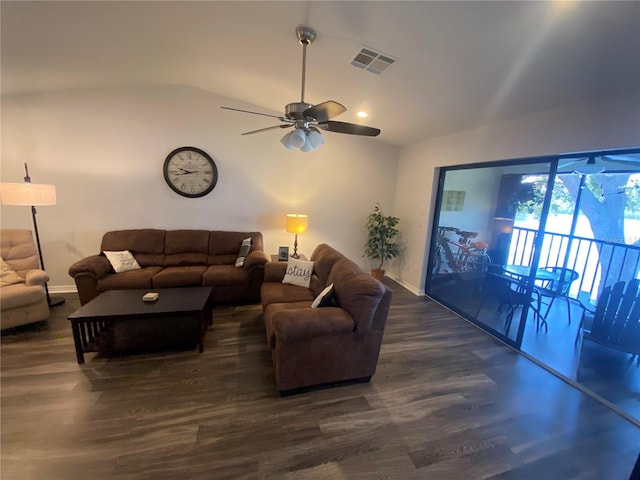 living room with vaulted ceiling, dark wood-type flooring, and ceiling fan