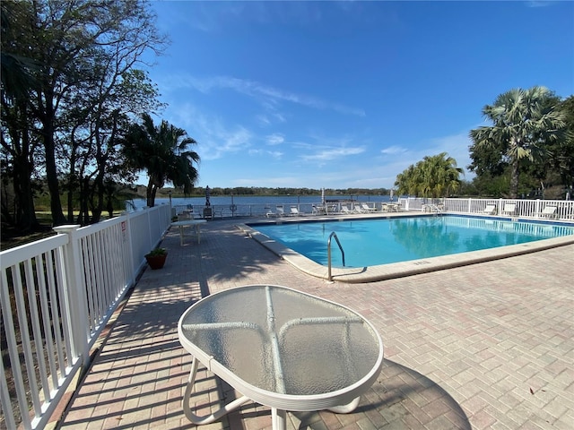 view of pool featuring a patio