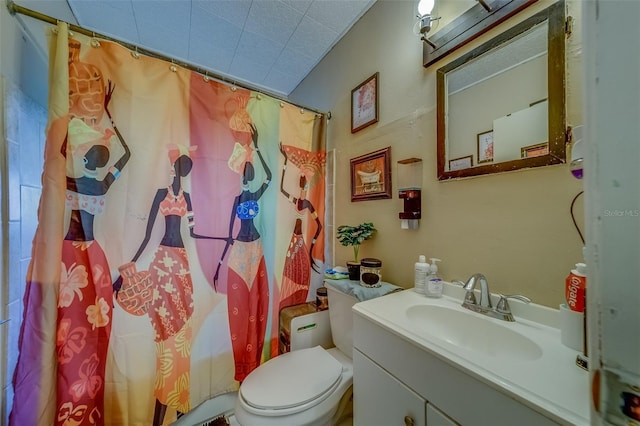 full bathroom with vanity, toilet, and shower / bath combo with shower curtain