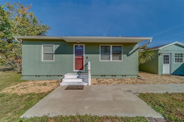 view of front of property with a patio