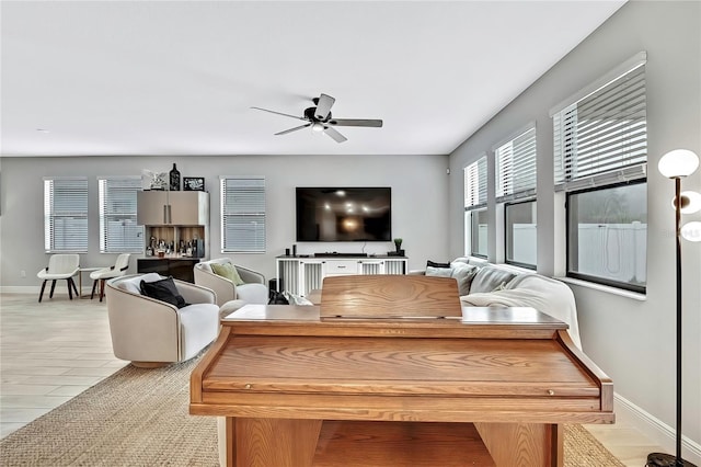 living room featuring ceiling fan