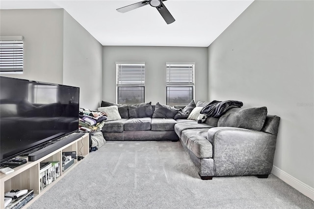 living room with carpet flooring and ceiling fan