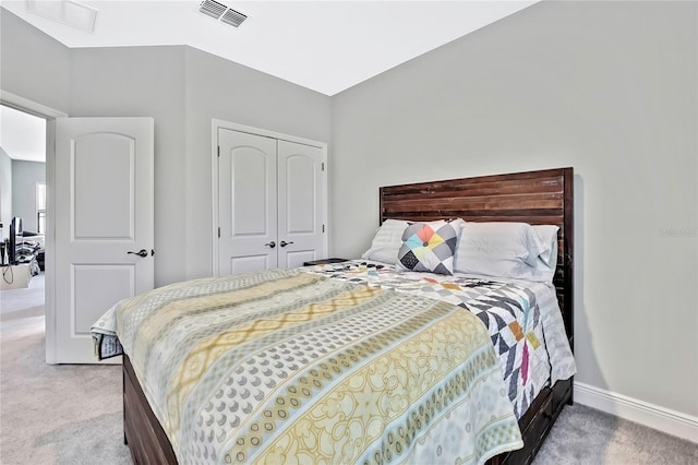 bedroom with a closet and carpet flooring