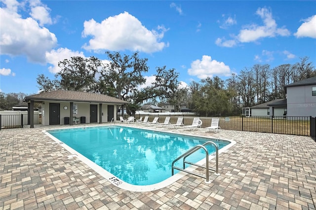 view of swimming pool featuring a patio area