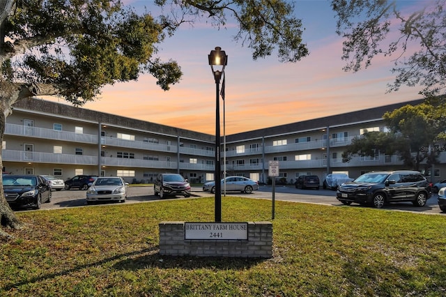 view of outdoor building at dusk