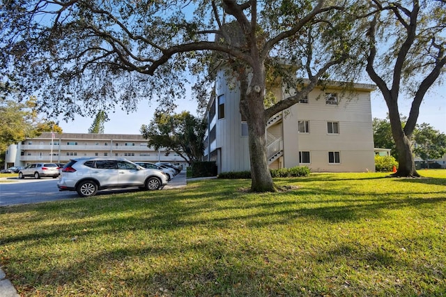 view of home's exterior featuring a yard