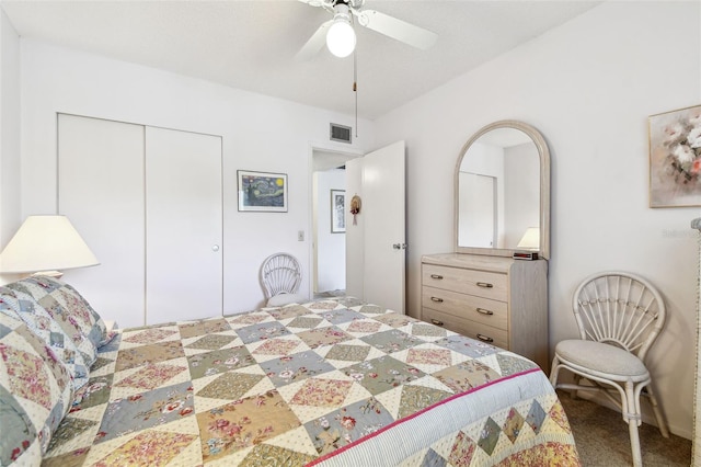 bedroom featuring carpet floors, a closet, and ceiling fan