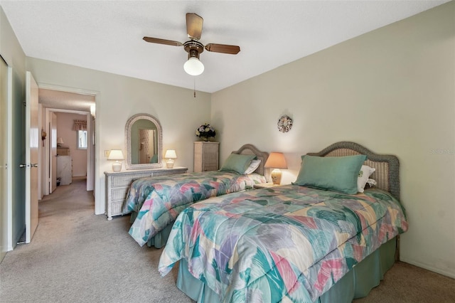 bedroom with light colored carpet and ceiling fan