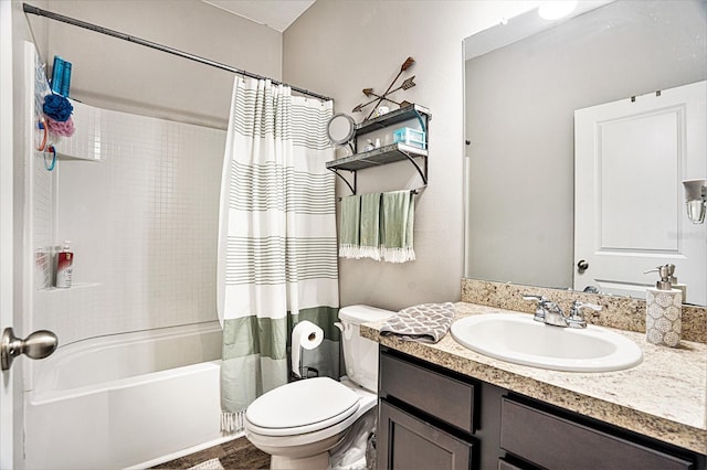 full bathroom with vanity, toilet, and shower / bath combo