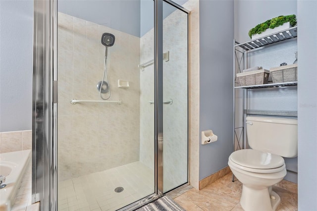 bathroom with toilet and walk in shower