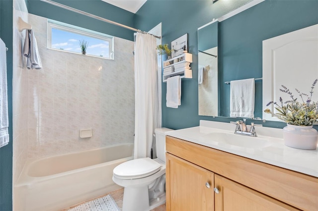 full bathroom featuring toilet, vanity, and shower / bathtub combination with curtain