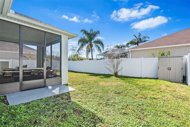 view of yard featuring a sunroom