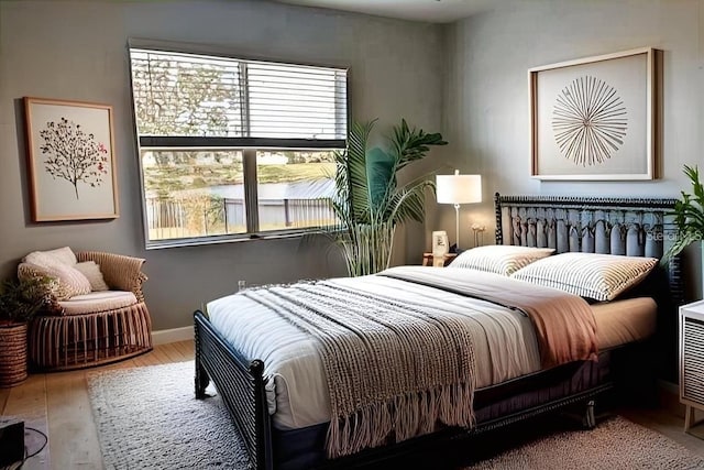 bedroom featuring hardwood / wood-style floors