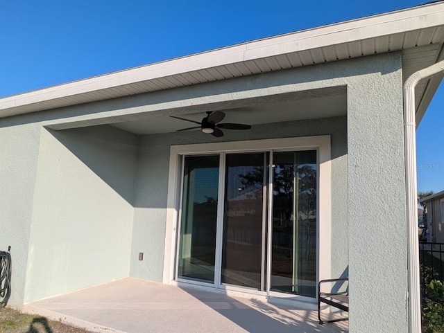 view of patio with ceiling fan