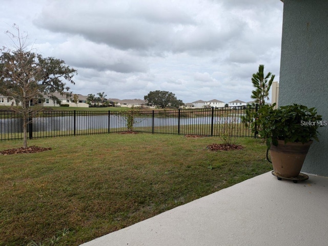 view of yard with a water view