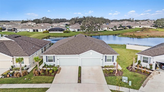 bird's eye view with a water view