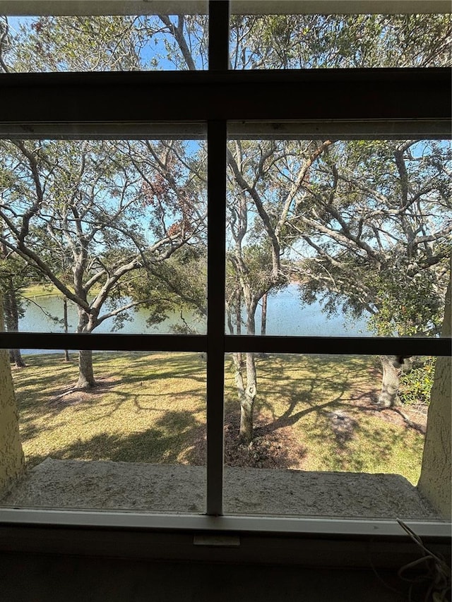 interior details featuring a water view