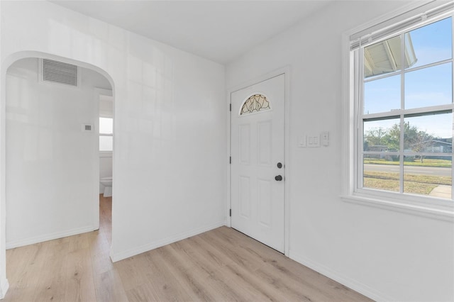 entryway with light hardwood / wood-style flooring