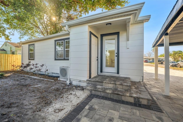 property entrance featuring ac unit