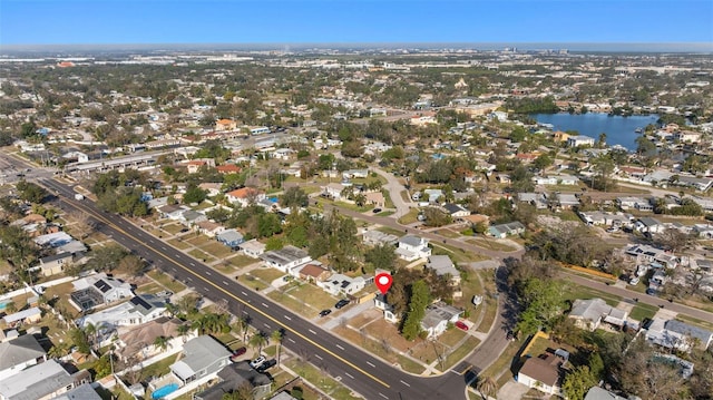 drone / aerial view with a water view