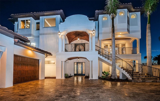 view of front of home with a garage