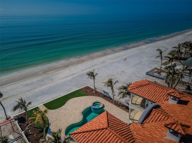 aerial view with a view of the beach and a water view