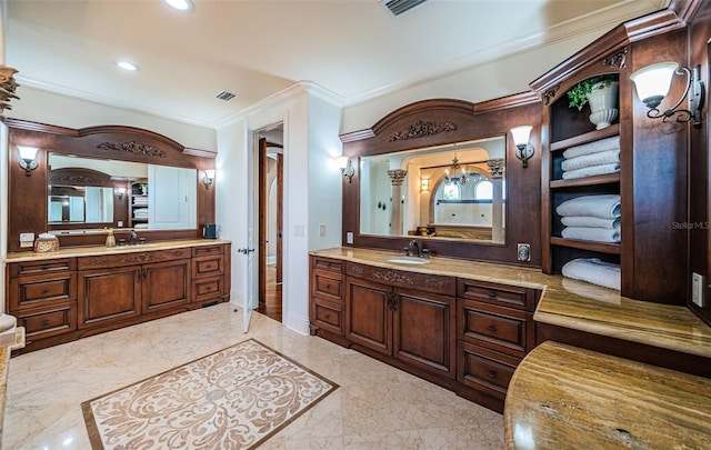 bathroom with vanity and ornamental molding