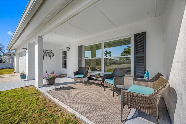 view of patio / terrace with a garage