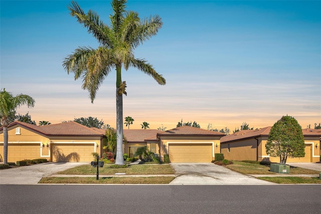 single story home with a garage