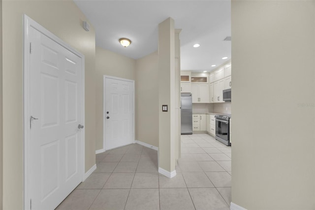 entrance foyer with light tile patterned flooring