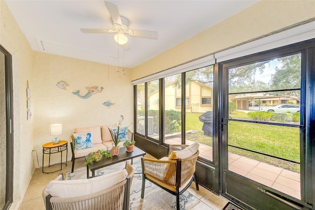 2546 Oakleaf Ln Unit 35D, Clearwater, FL 33763 - sunroom / solarium with ceiling fan and an outdoor living space